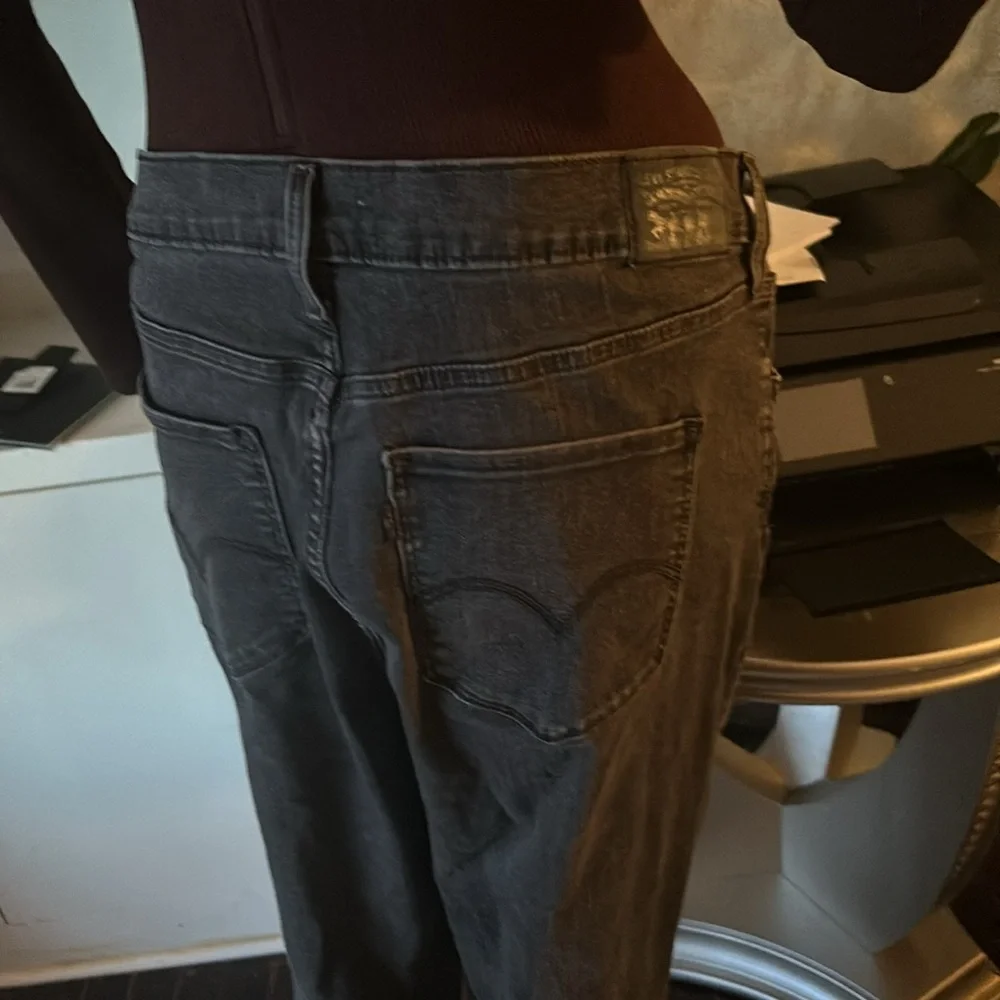 Levis 720 High Rise Super Skinny Jeans Sz 33 gray great condition
